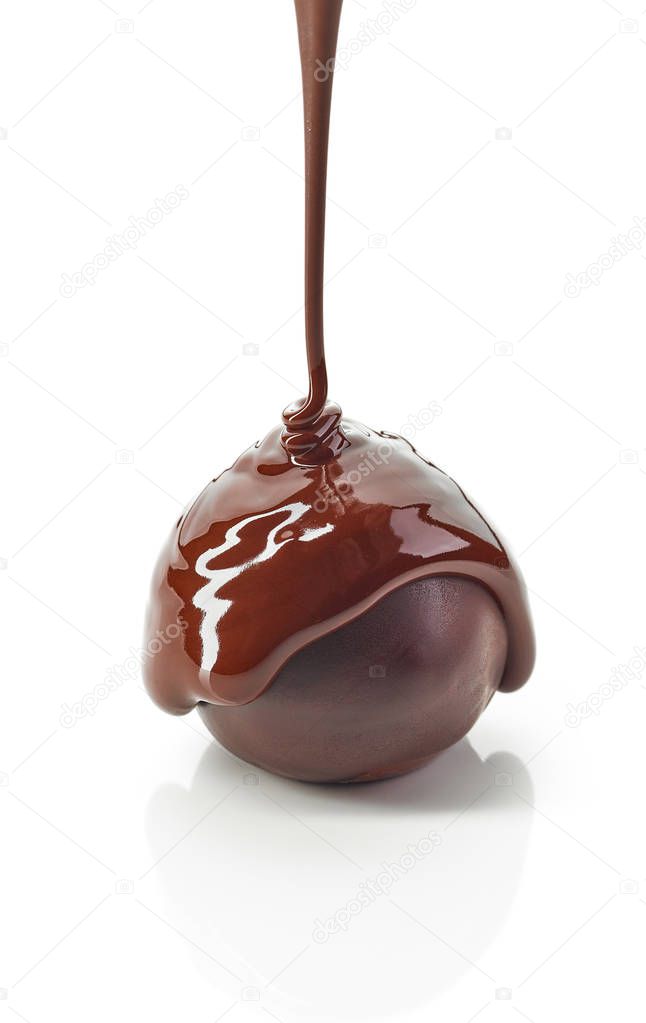 Chocolate truffle covered with melted chocolate isolated on white background