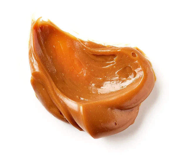 Melted caramel on a white background — Stock Photo, Image