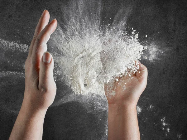 Baker hands with flour in motion — Stock Photo, Image