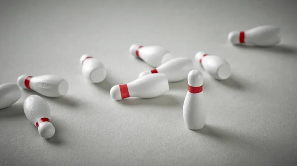 Bowling pins on grey background — Stock Photo, Image