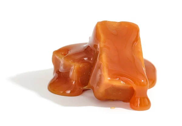 Caramel candies on white background — Stock Photo, Image