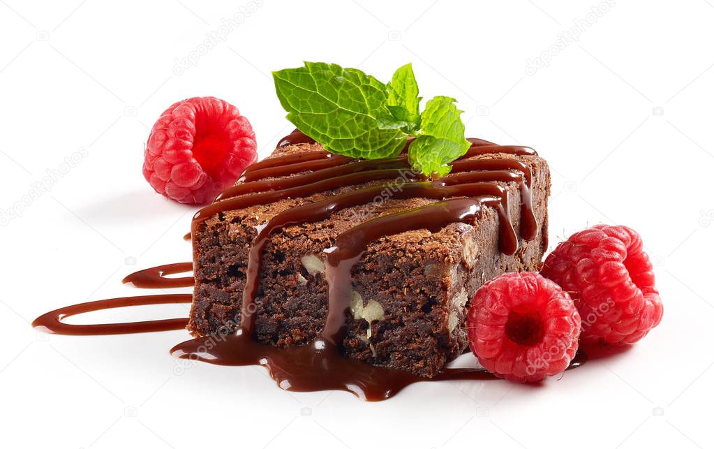 piece of chocolate cake brownie with raspberries