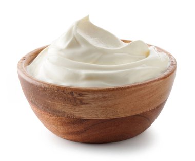wooden bowl of whipped sour cream yogurt isolated on white background clipart