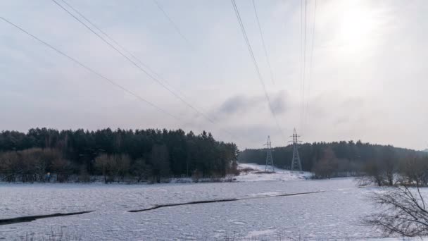 冬の川と送電線 時間経過 — ストック動画