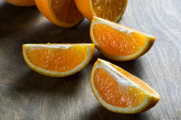 Sliced Three Orange Slices Rustic Table Closeup — Stock Photo, Image