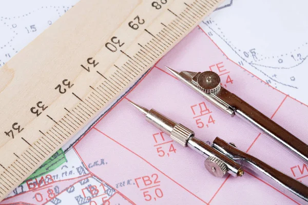 Topographic map of district with  measuring instrument and ruler — Stock Photo, Image