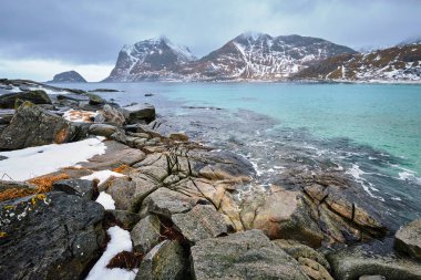 Rocky coast of fjord in Norway clipart