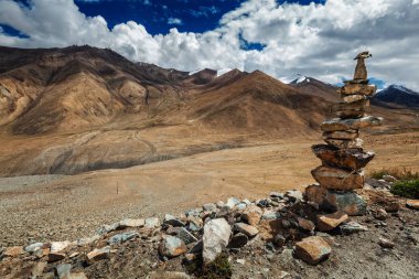 Stone cairn in Himalayas  clipart