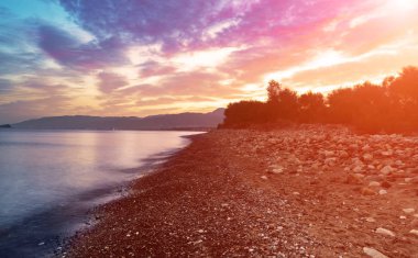 Denizde gün doğumu