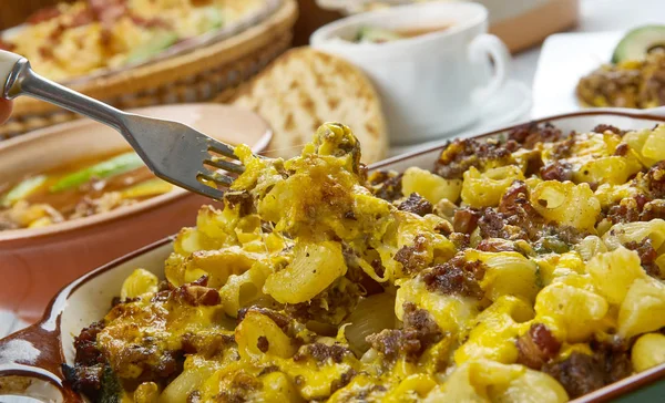 Taco Macaroni Casserole,macaroni and cheese ,  Tex-Mex  cuisine, Traditional assorted dishes, Top view.