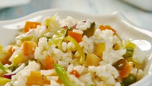 Caribbean Confetti Rice, fragrant coconut rice recipe loaded with chiles, sweet peppers, pineapple, cilantro, and spices