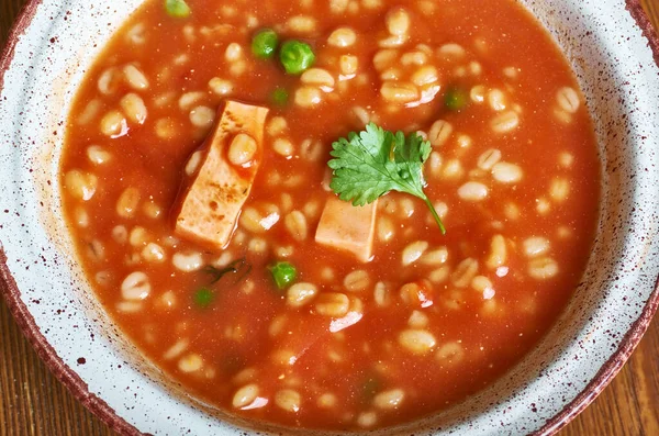 Sicilian Tomato Barley Soup , lassic tomato soup recipe — Stock Image Sicilian Tomato Barley Soup Lassic Tomato Soup Recipe Royalty Free Stock Photos