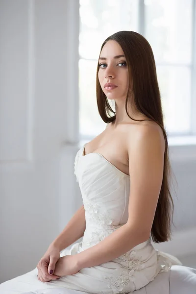 Portrait Pretty Brunette Bride Posing Wedding Dress Sofa Looking Camera — Stock Photo, Image