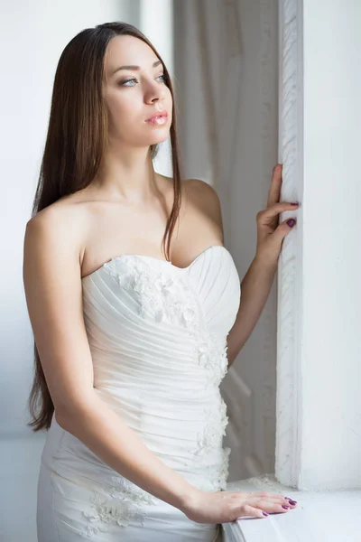 Portrait Thoughtful Brunette Bride Wearing Wedding Dress Looking Window — Stock Photo, Image