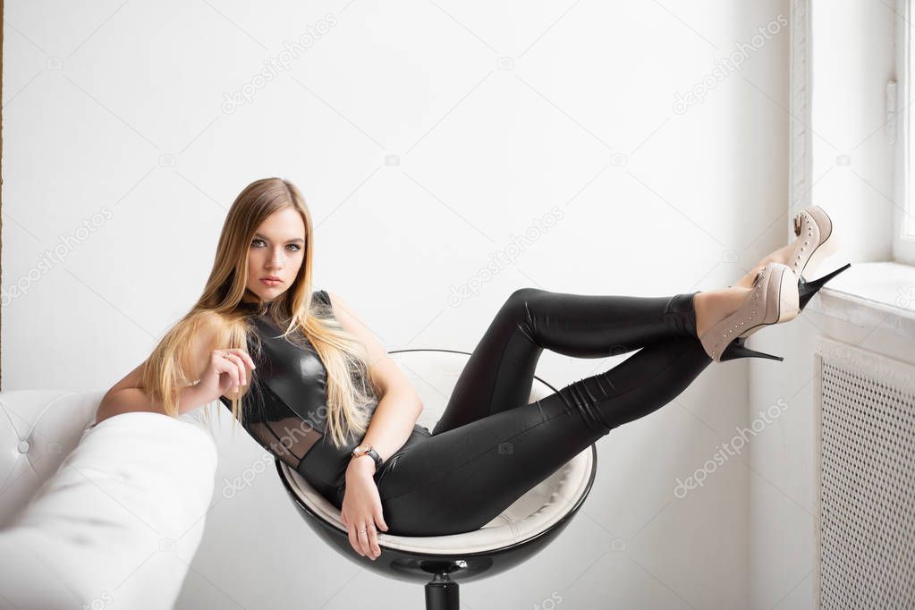 young beautiful woman in black clothing