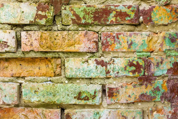 Alte farbige Ziegelmauer — Stockfoto