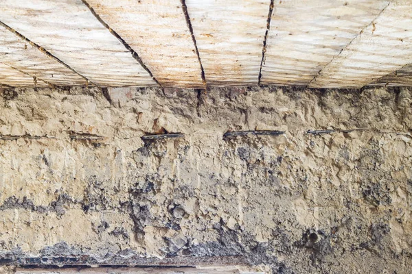 Old wooden ceiling and wall before repair