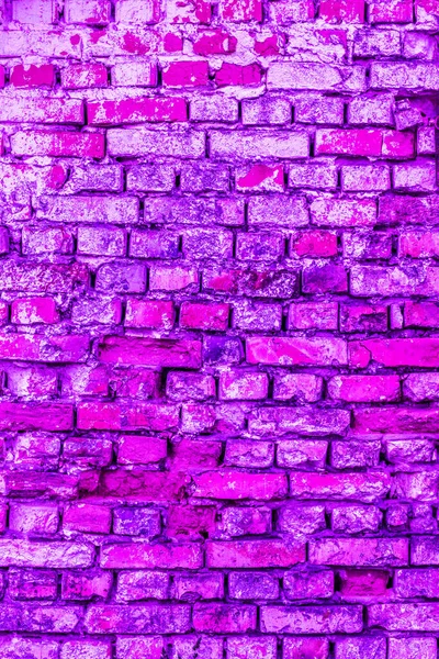 Pink and purple brick wall background. Architecture facade texture. House interior background