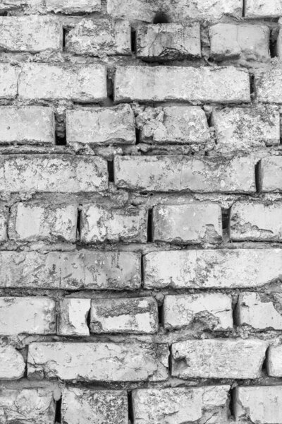 Retro brick wall vertical backdrop. Architecture facade texture. House interior background