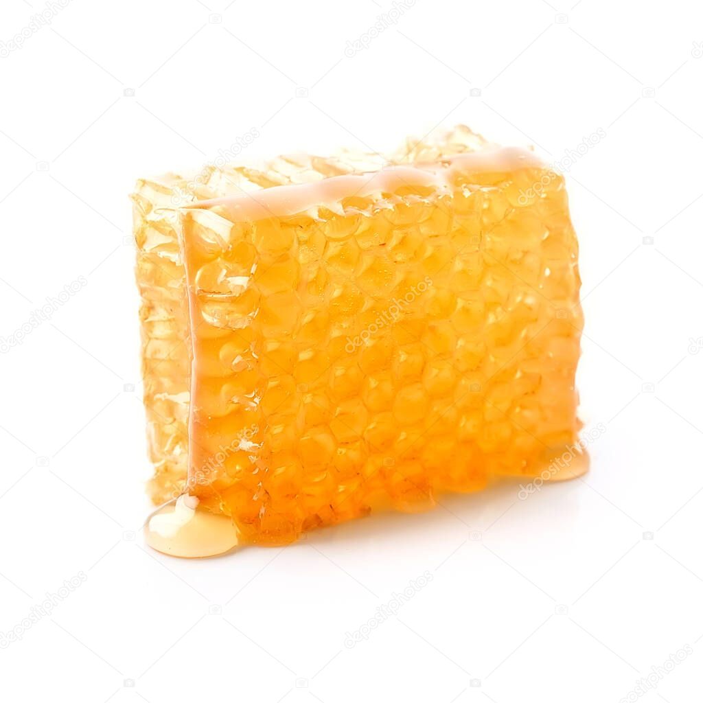 Honey and honeycomb isolated on white backgrounds.
