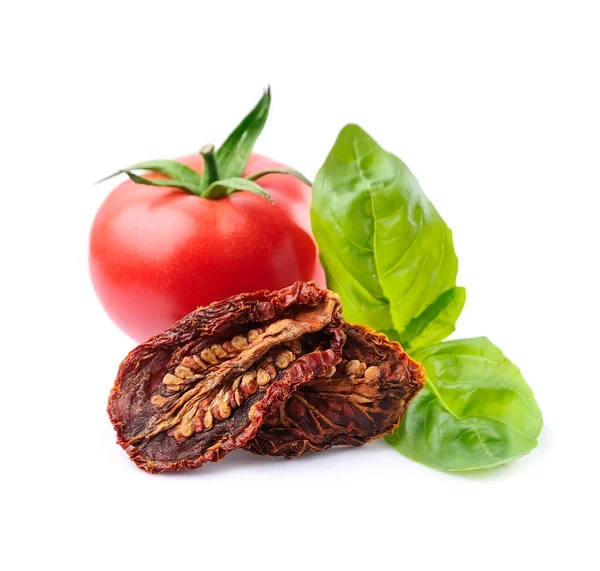 Tomatoes Vegetables Dried Tomato Basil Leaves Closeup White Backgrounds — Stock Photo, Image