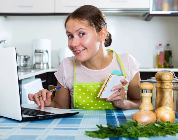Woman looking for new recipe — Stock Photo, Image