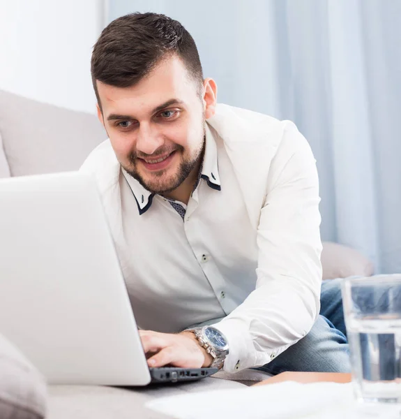 Smiling Young Man Happy Book Hotel Online Home — Stock Photo, Image