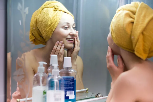 Portrait Young Smiling Woman Wearing Towel Shower Looking Herself Mirror — Stock Photo, Image