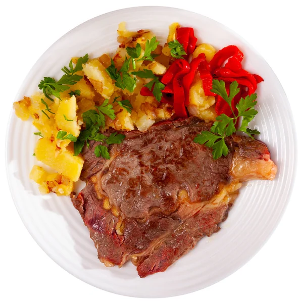 Veal steak with fried potato and pepper — Stock Photo, Image