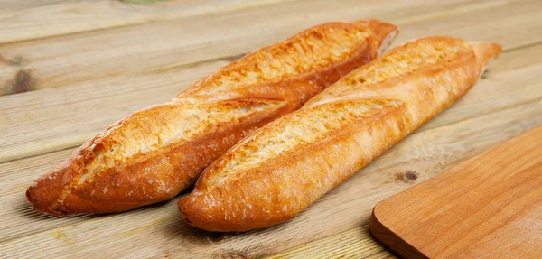 Image of crunchy homemade fresh baked baguettes — Stock Photo, Image