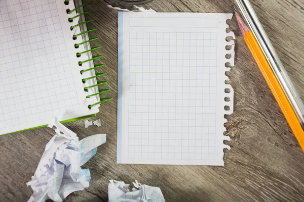 Torn crumpled notebook sheet — Stock Photo, Image