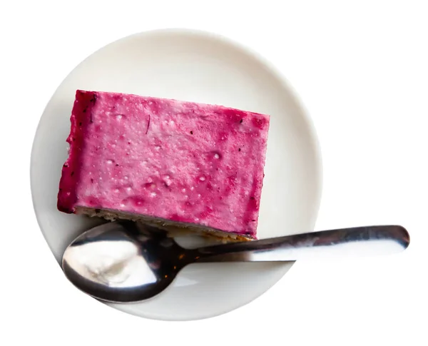 Cake with raspberry glaze on white plate — Stock Photo, Image