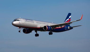 Airplane Aeroflot airline lands on the runway in an aeroport El Prat city of Barcelona clipart