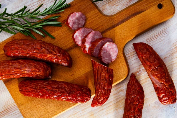 Czech dried sausages on wooden table — Stock Photo, Image