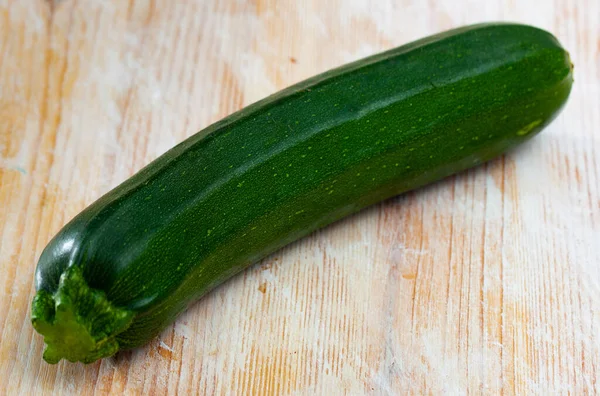 Zucchini on wooden table — Stock Photo, Image