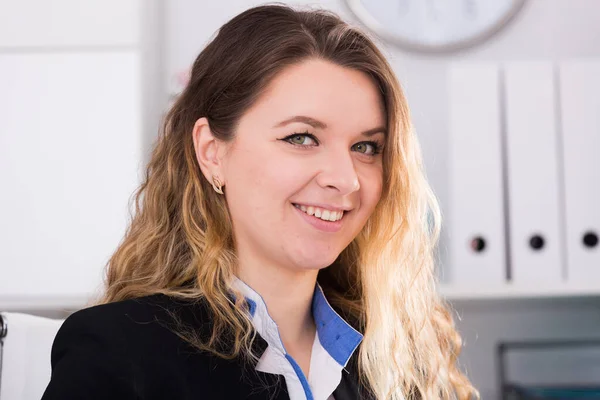 Cheerful businesswoman in suit working — Stock Photo, Image