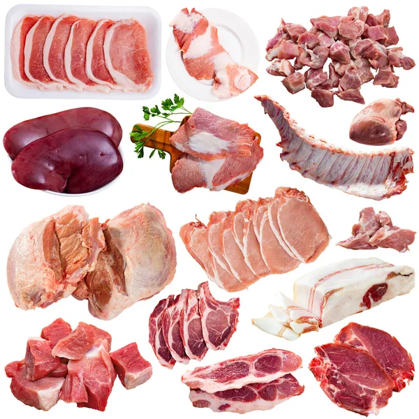 Assorted types of raw pork meat isolated — Stock Image Assorted types of raw pork meat isolated Stock Photo