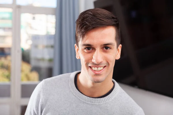 Portrait of stylish young man in living room — Stock Photo, Image