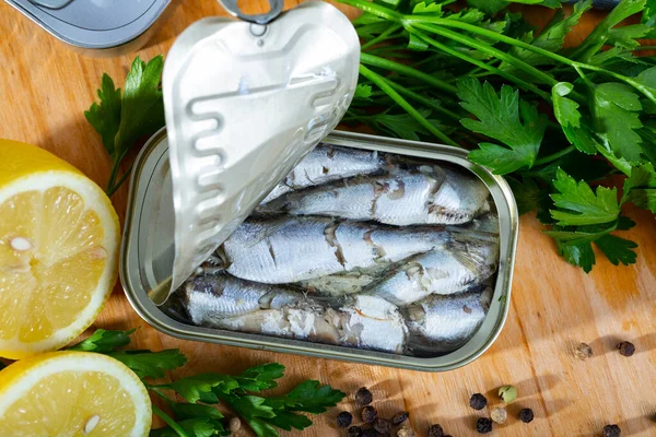 Open can of sardines in oil — Stock Image Open can of sardines in oil Stock Image