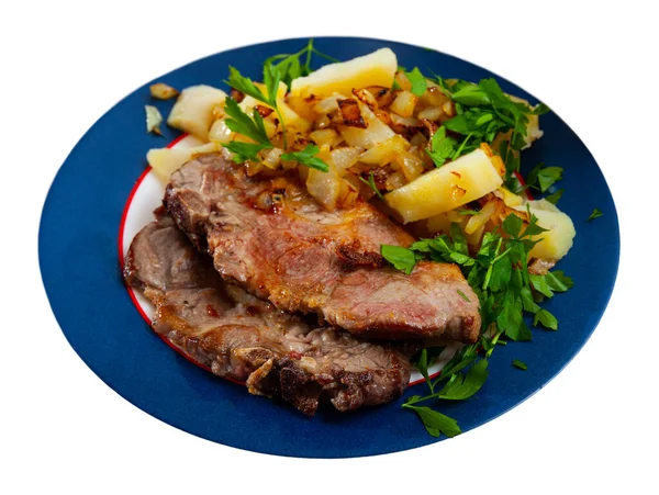 Eet gebakken varkensvlees met aardappelen en kruiden — Stockfoto
