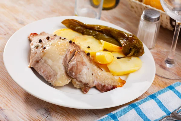 Pork steak with baked potato and pepper — Stock Photo, Image