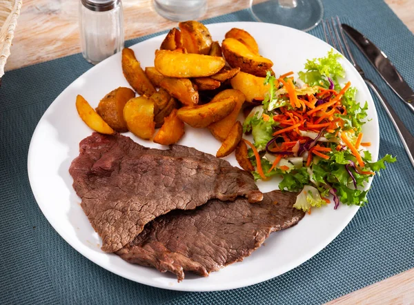 Grilled lamb with baked potato, homemade dinner — Stock Photo, Image