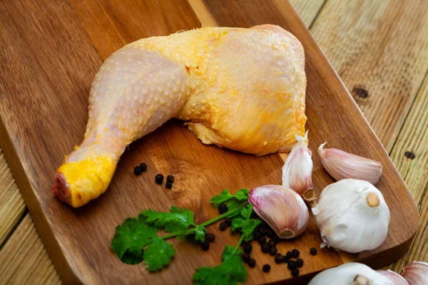 Natural raw chicken leg quarter with seasonings — Stock Photo, Image