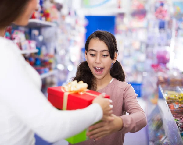 Girl receives boxes with gifts — Stock Photo, Image