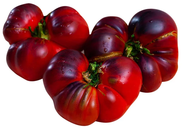 Smaczne, apetyczne niebieskie pomidory na białym — Zdjęcie stockowe