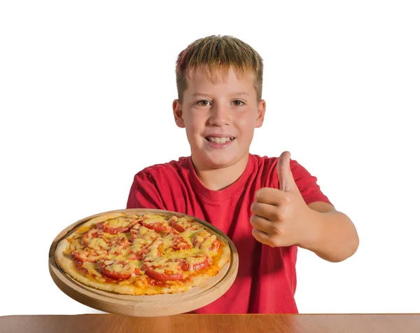 Vrolijke Tiener Houdt Van Een Pizza Zijn Hand Een Houten — Stockfoto