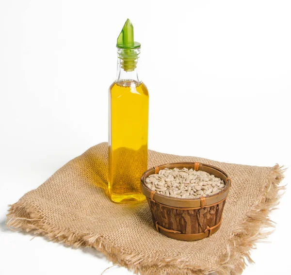 Sunflower seeds and oil — Stock Photo, Image