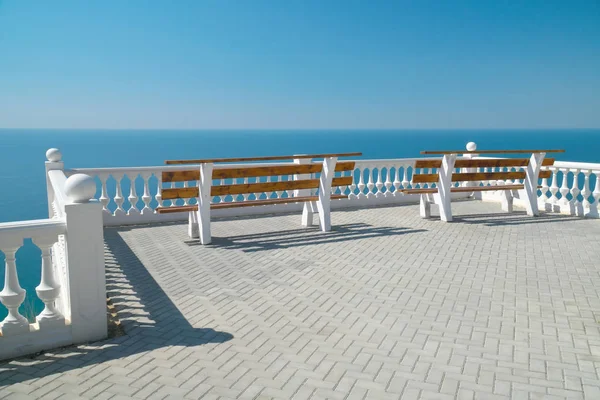 Balcony on the sea view with bench.