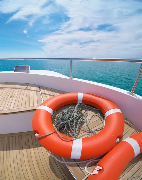 Lifebuoy on the yacht deck. Recreation on sea travel.