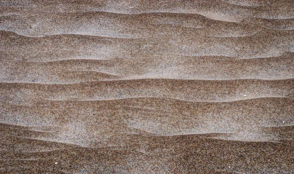 沙子纹理在海滩 风创造了小沙丘 — 图库照片